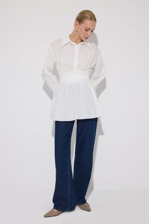 PEPLUM TUNIC WITH CORSET AT THE WAIST